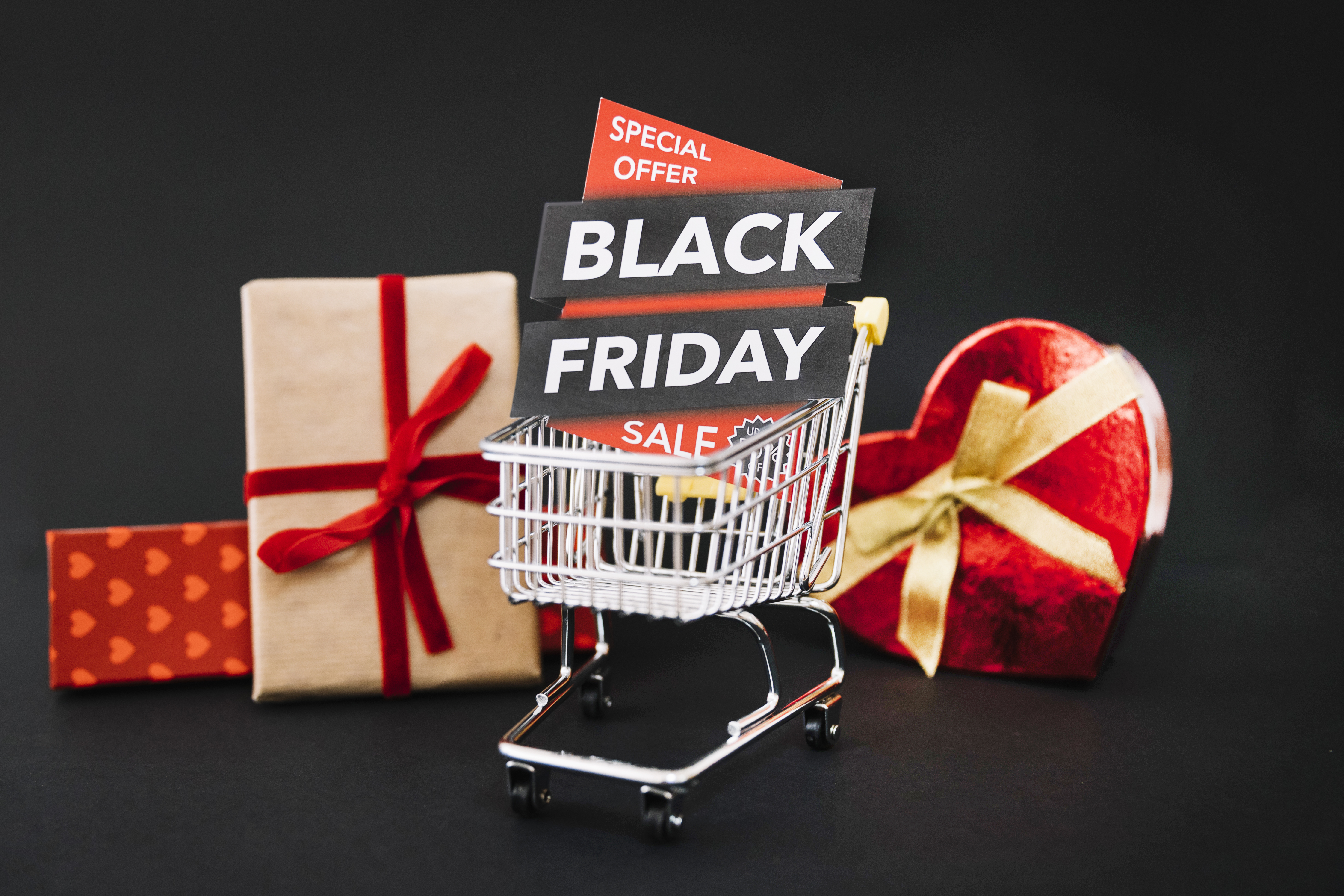 Presents and shopping cart with black friday label